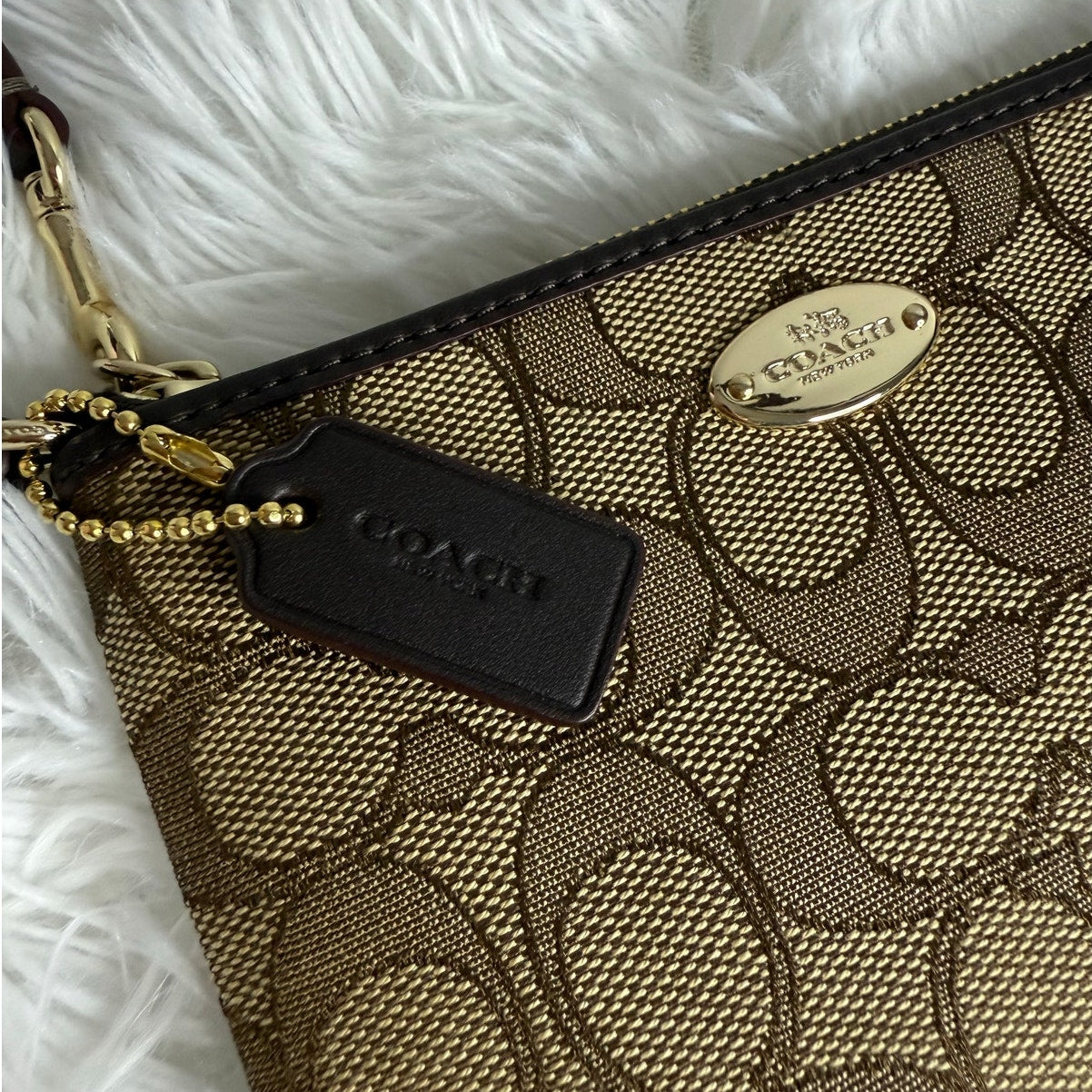 COACH Brown Signature Canvas Wristlet