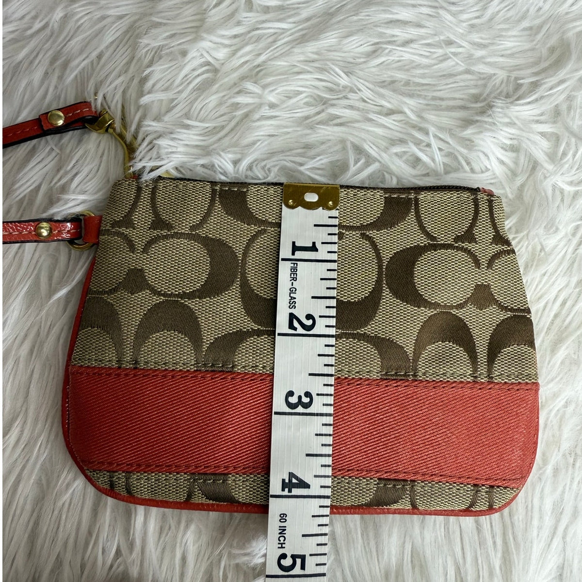 COACH Orange Brown Signature Wristlet