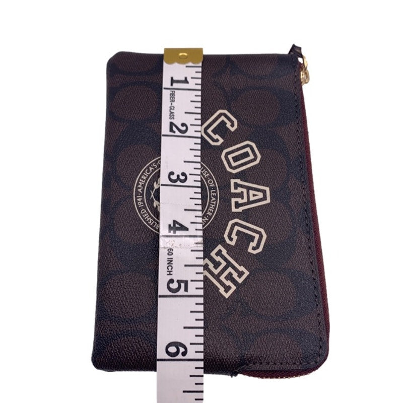 COACH Brown Coated Canvas Wristlet