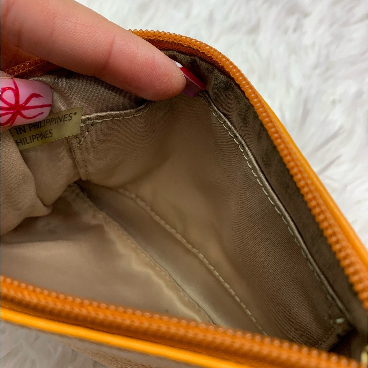 COACH Orange Wristlet