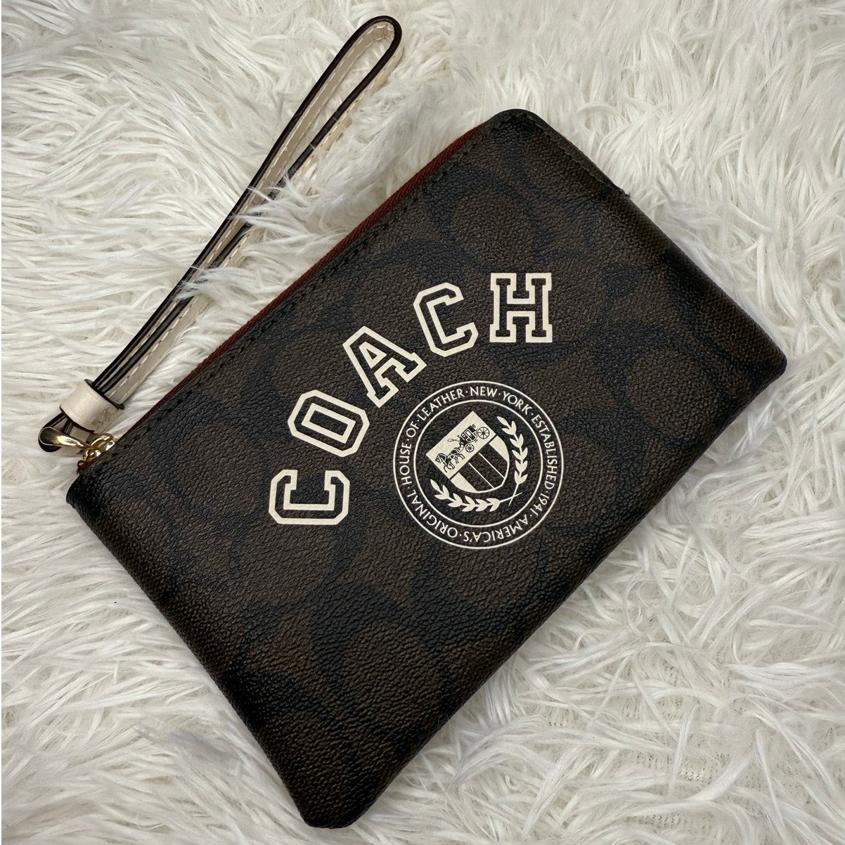 COACH Brown Coated Canvas Wristlet