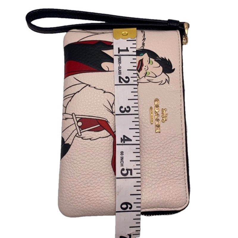 Disney X COACH Corner Zip Wristlet With Cruella Motif