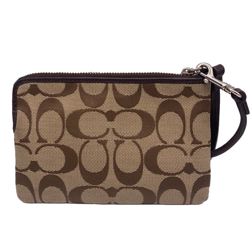 COACH Brown Signature Canvas Wristlet