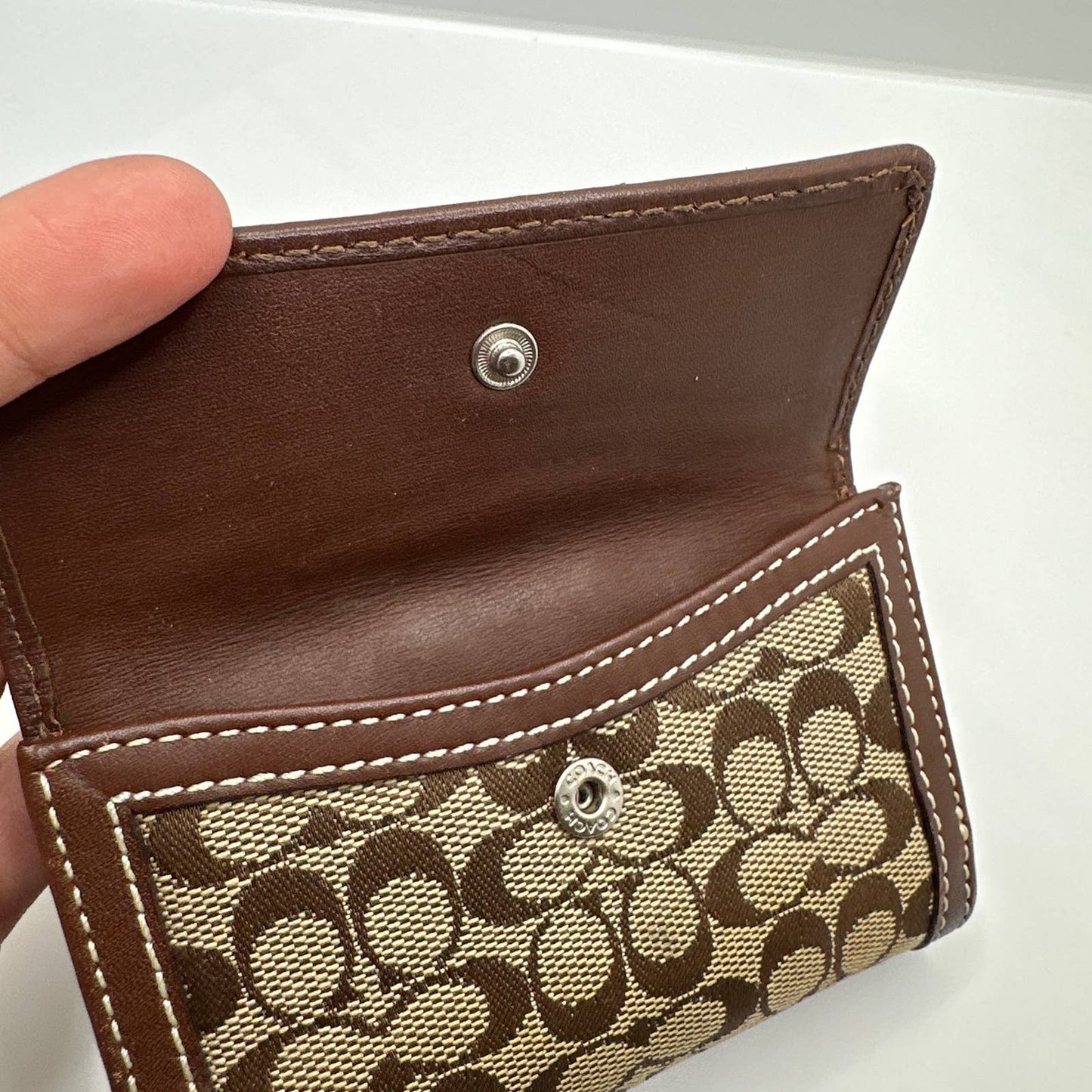 COACH Brown Signature Canvas Trifold Wallet