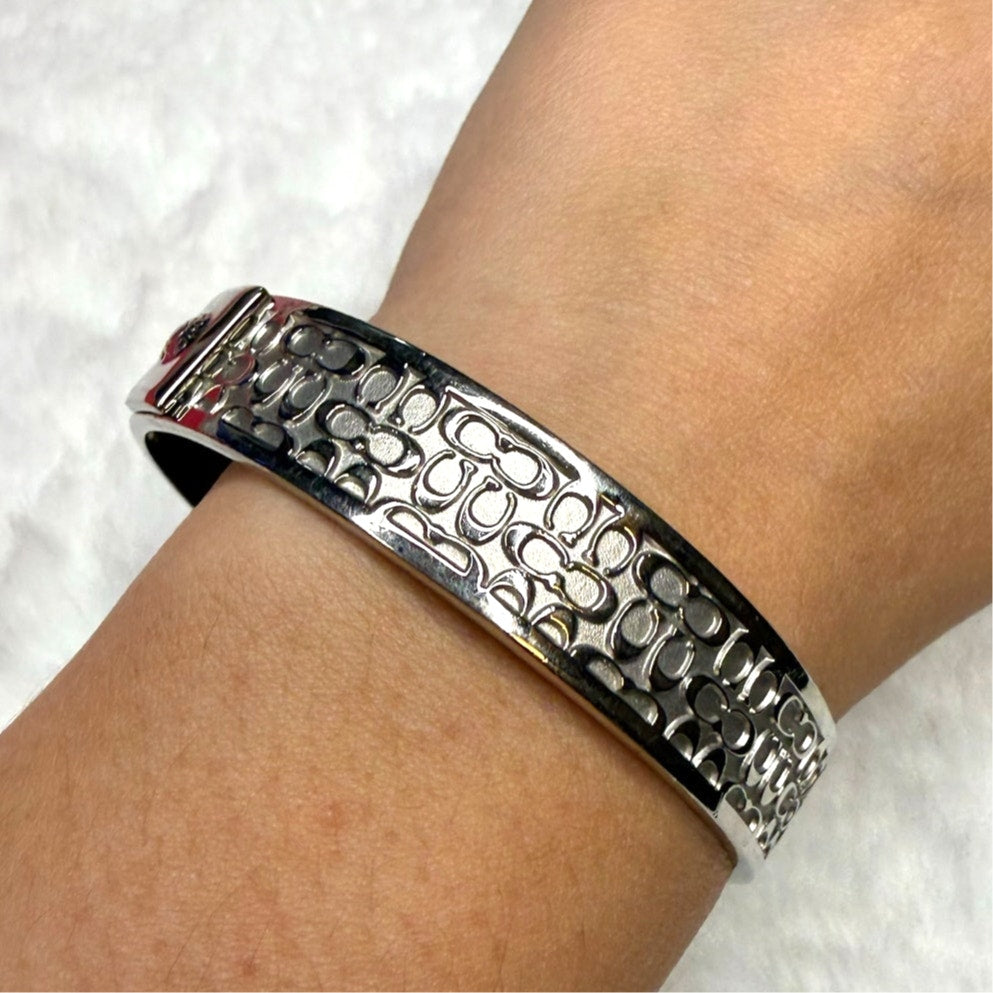 COACH Silver-Tone Quilted C Bangle Bracelet