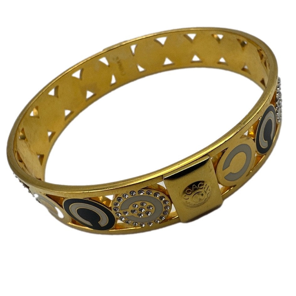 COACH HALF INCH PIERCED OP ART DISC BANGLE Bracelet