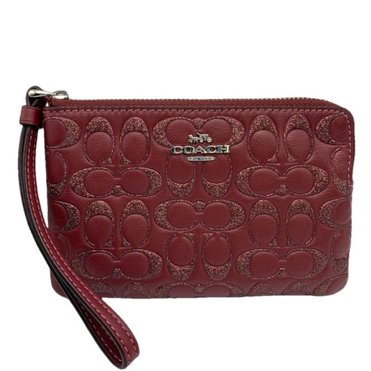 COACH Signature Zip Wristlet