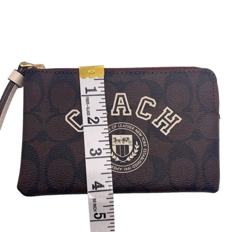 COACH Brown Coated Canvas Wristlet