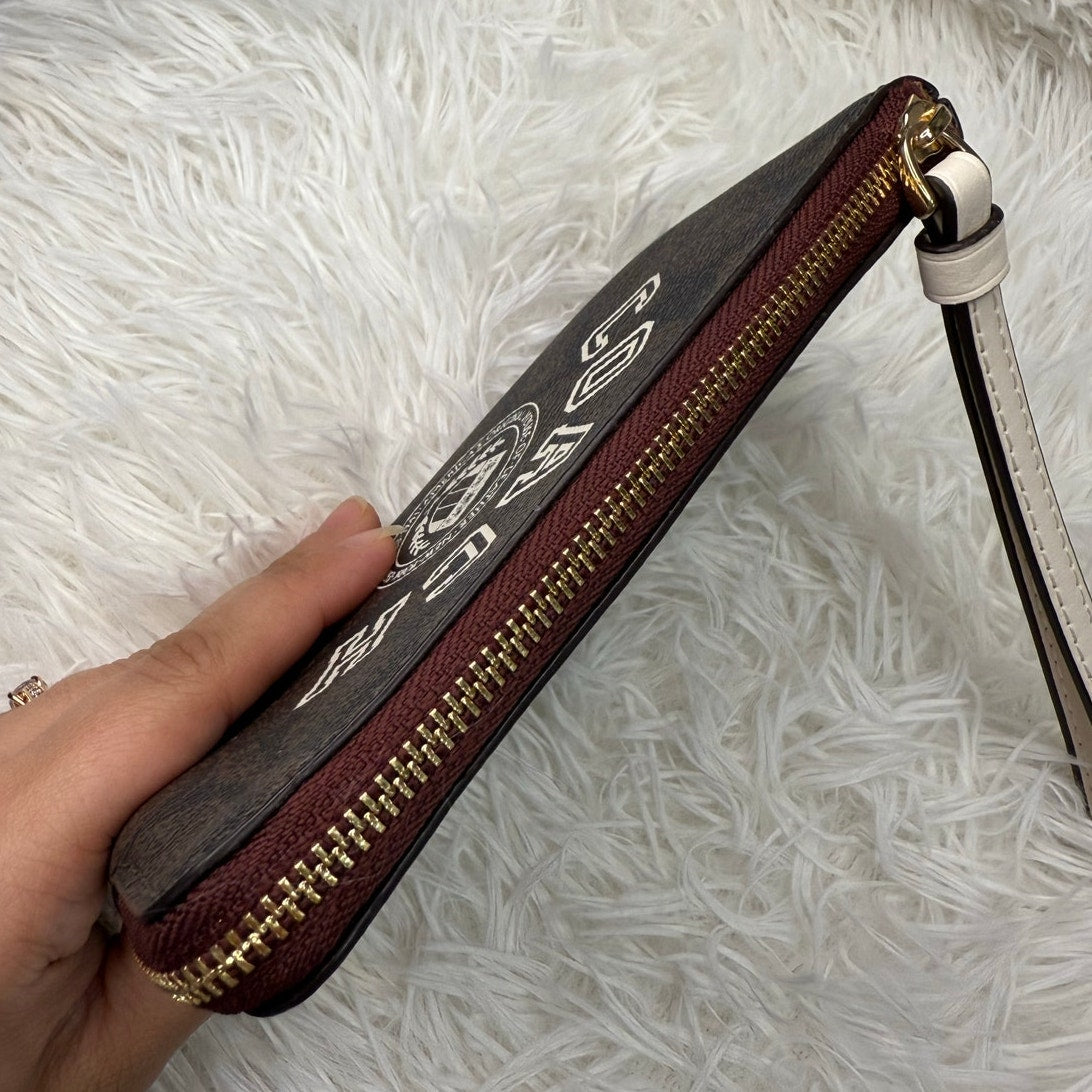 COACH Brown Coated Canvas Wristlet