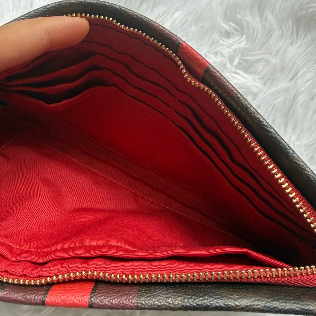 COACH Brown Red Coated Canvas Large Wristlet