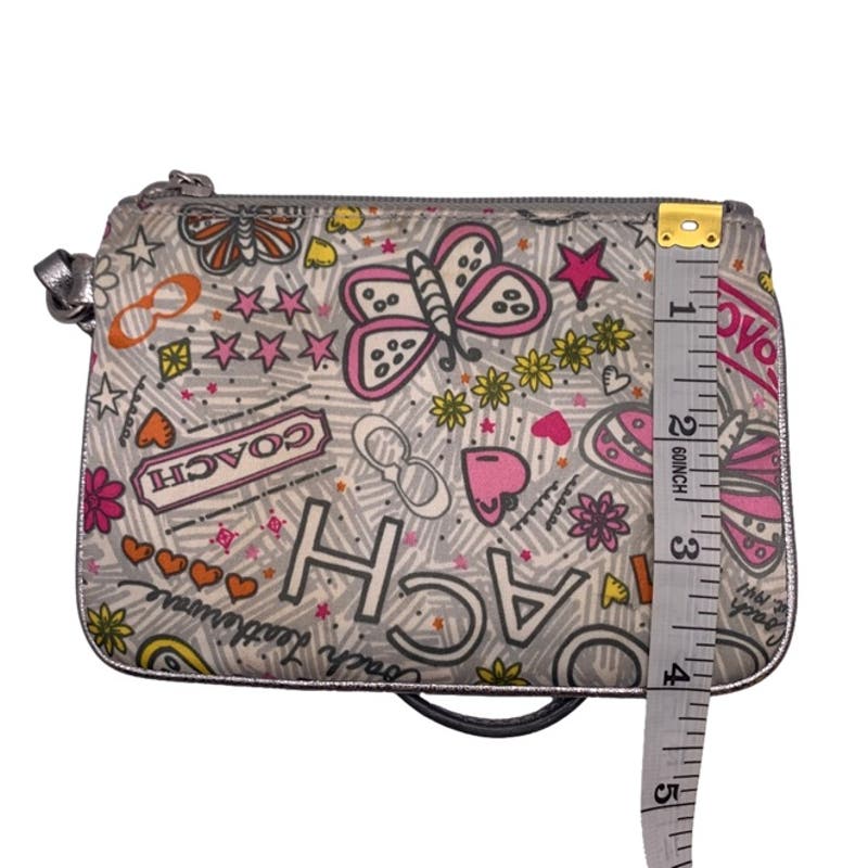 COACH Poppy Graffiti Wristlet