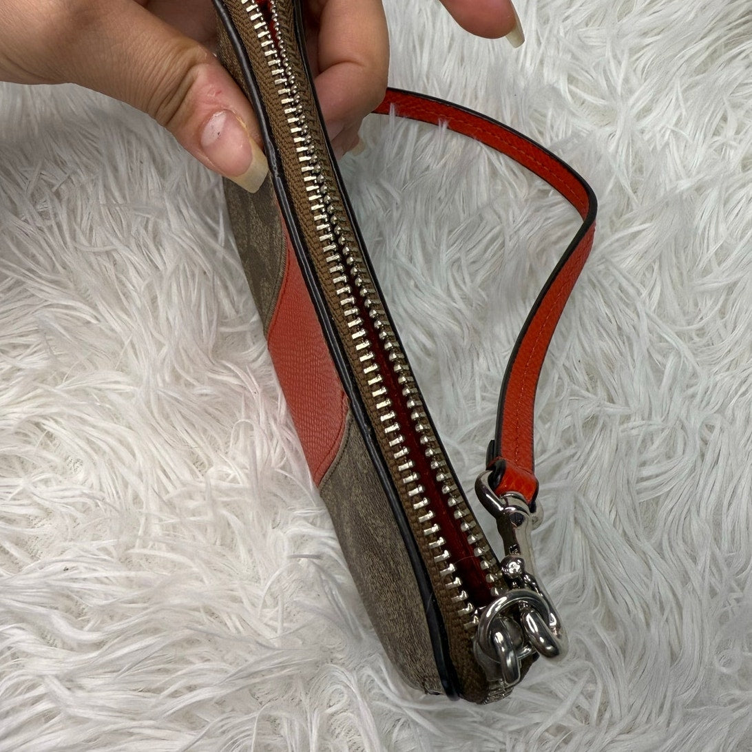 COACH Brown orange Zip Wristlet