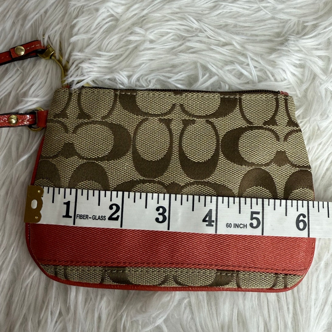 COACH Orange Brown Signature Wristlet
