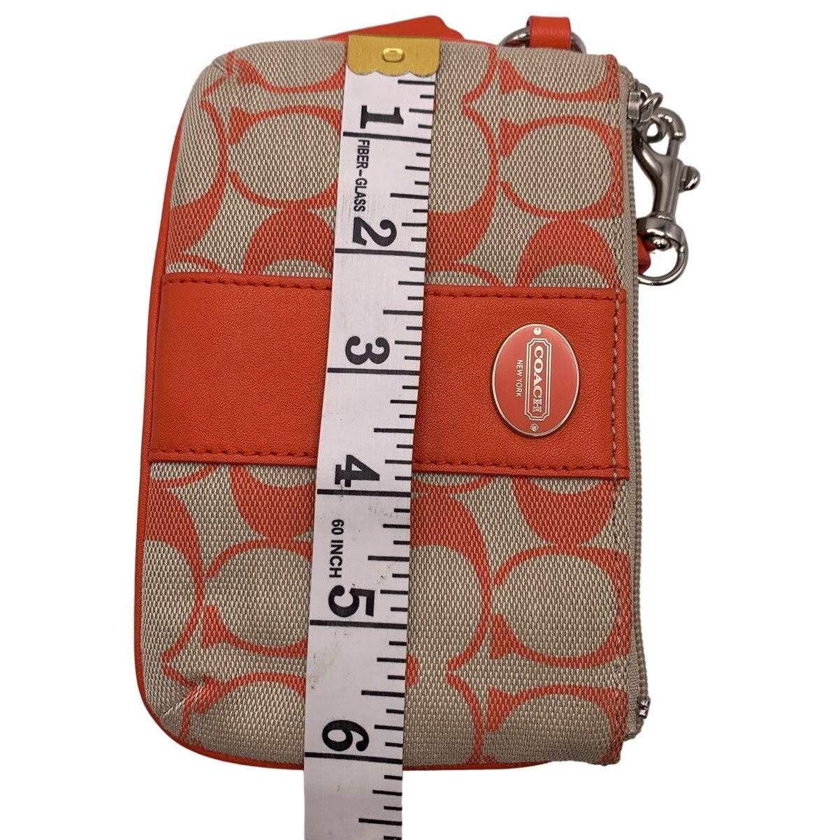 COACH Orange Signature Canvas Wristlet