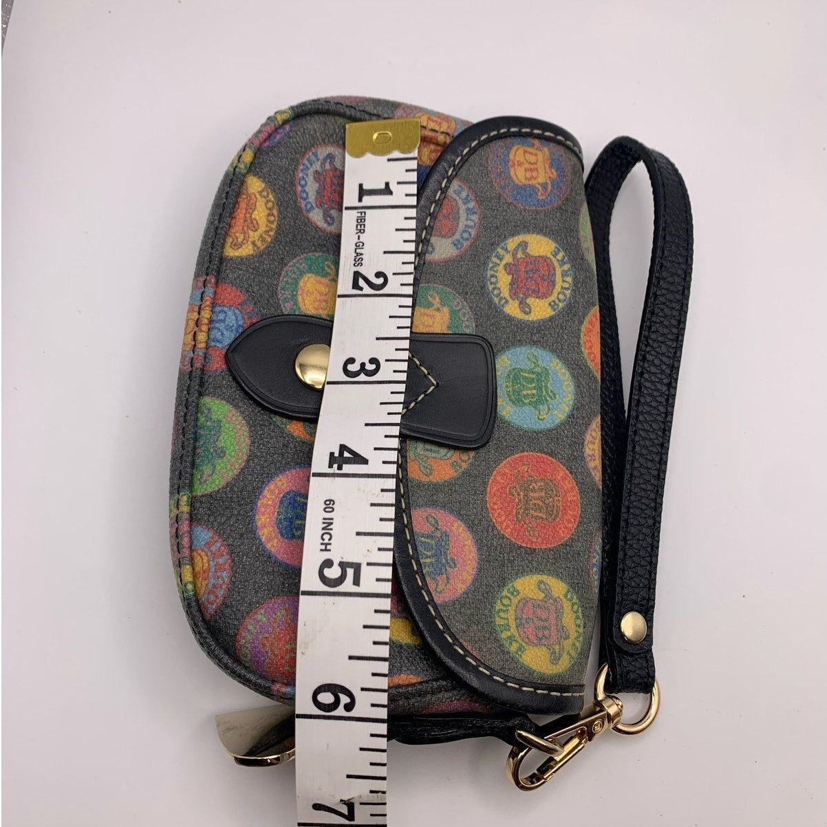 Vintage DOONEY & BOURKE Stamp Medallion Multi Color Wristlet