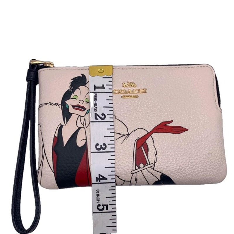 Disney X COACH Corner Zip Wristlet With Cruella Motif