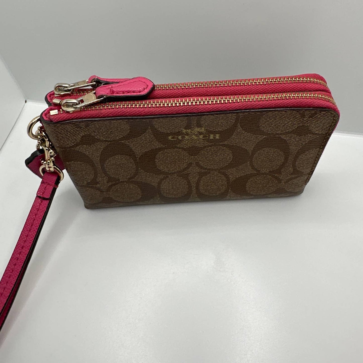 COACH Pink and Brown Signature Coated Canvas Wristlet