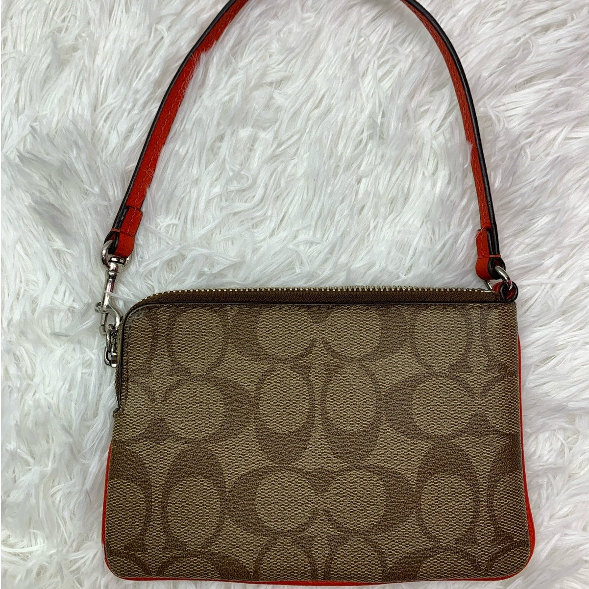 COACH Brown and Orange Coated Canvas Wristlet