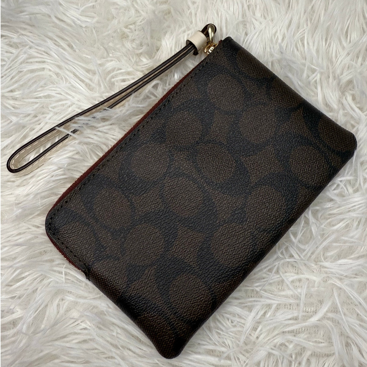 COACH Brown Coated Canvas Wristlet