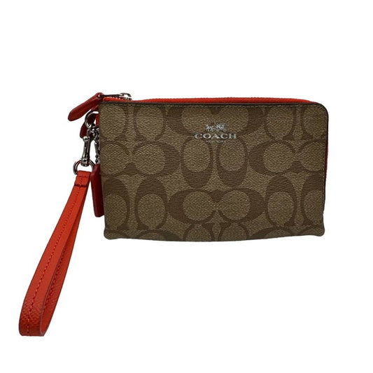 COACH Brown Signature Coated Canvas Wristlet