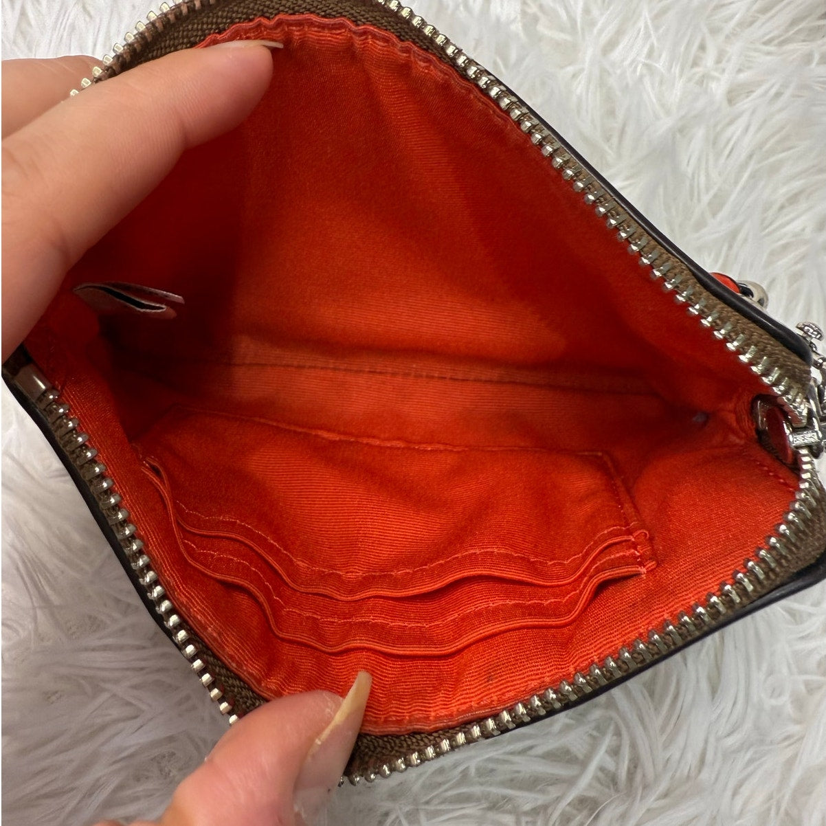 COACH Brown orange Zip Wristlet