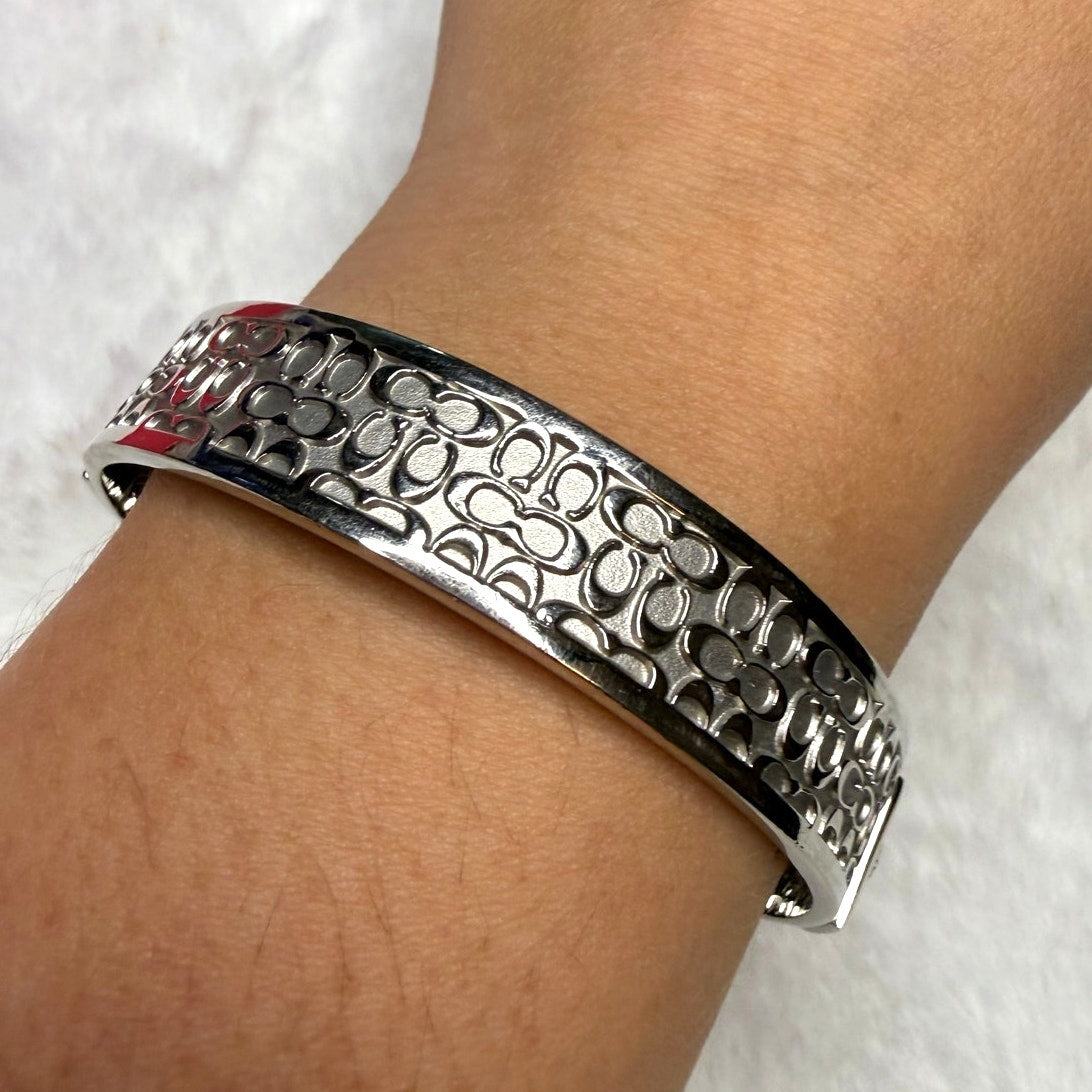 COACH Silver-Tone Quilted C Bangle Bracelet