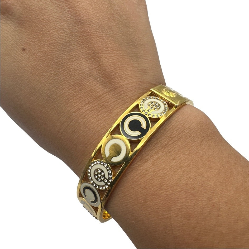 COACH HALF INCH PIERCED OP ART DISC BANGLE Bracelet