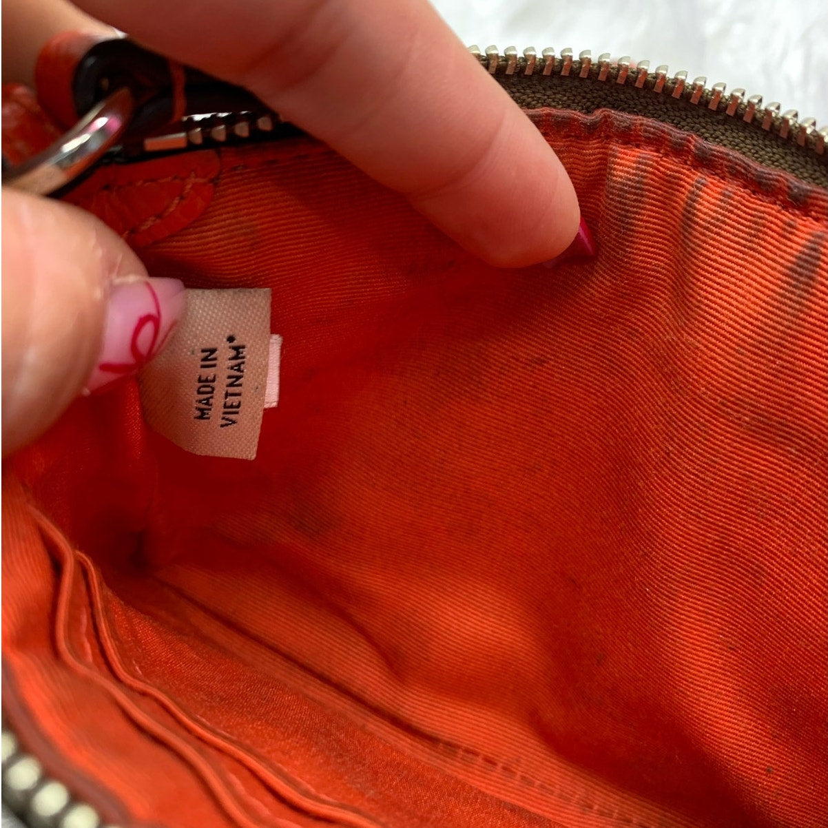 COACH Brown and Orange Coated Canvas Wristlet