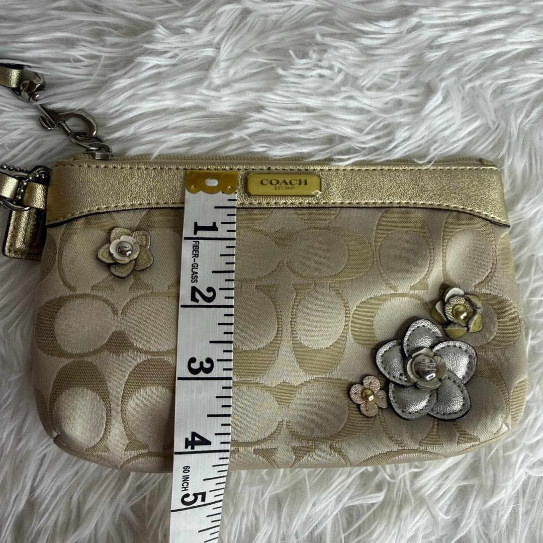 y2k COACH Gold Tan Floral Signature Canvas Wristlet