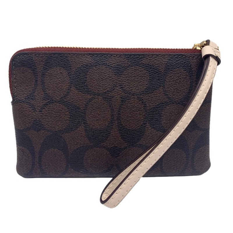 COACH Brown Coated Canvas Wristlet