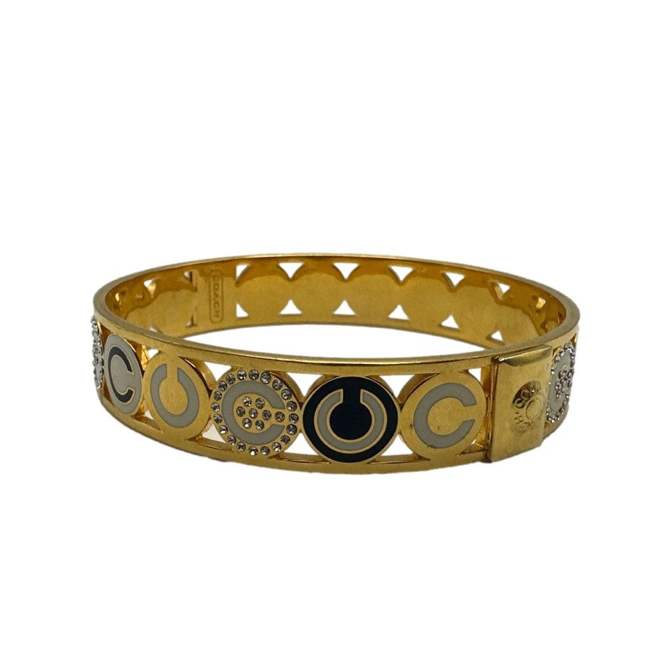 COACH HALF INCH PIERCED OP ART DISC BANGLE Bracelet