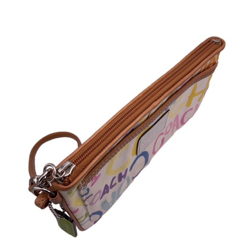 COACH Graffiti Signature Wristlet