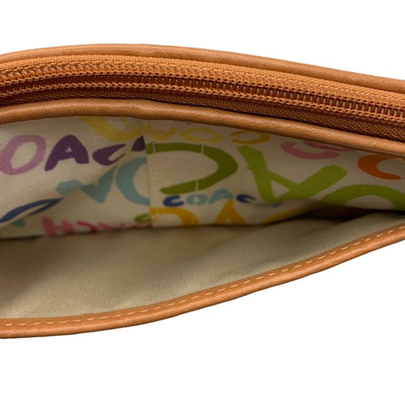 COACH Graffiti Signature Wristlet