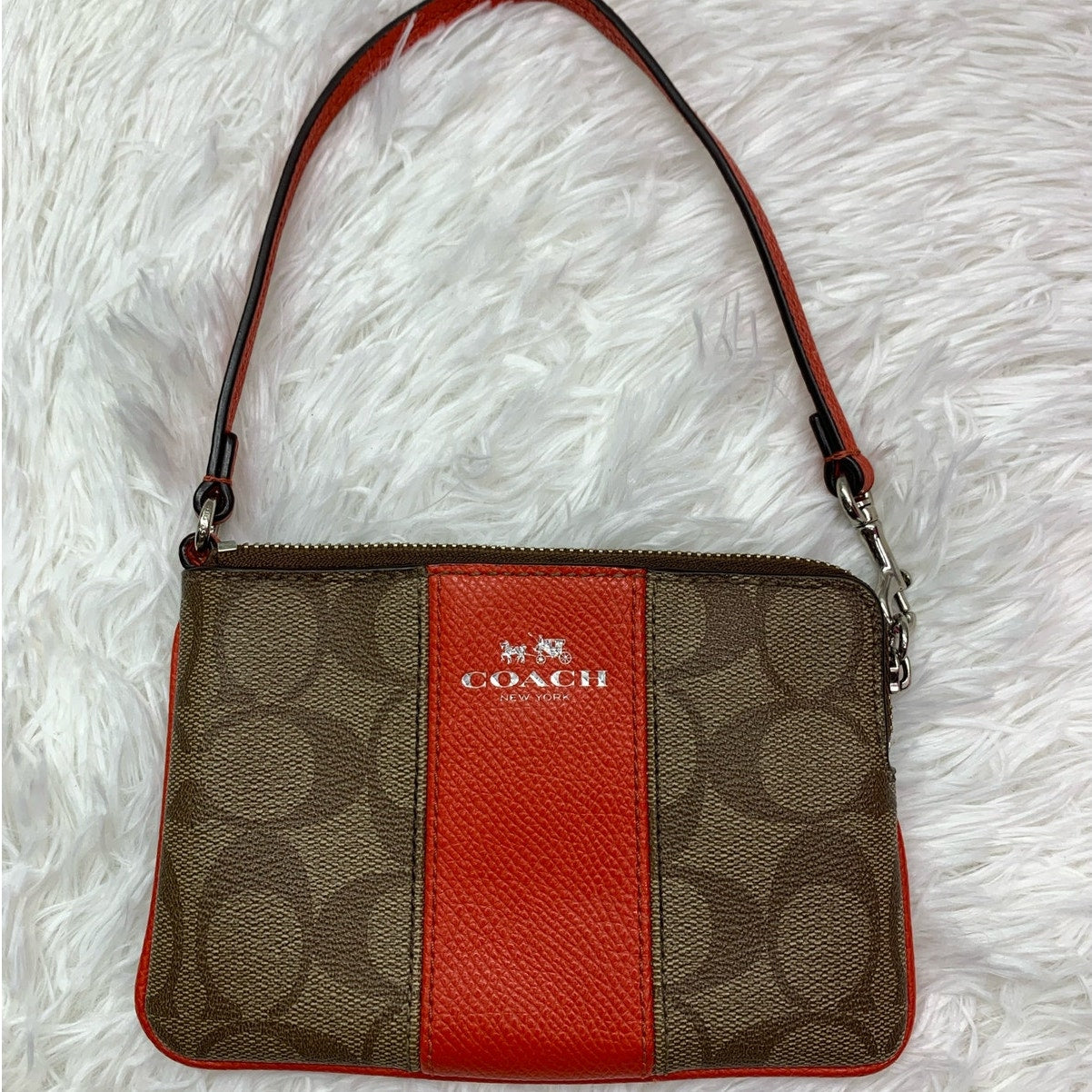 COACH Brown and Orange Coated Canvas Wristlet