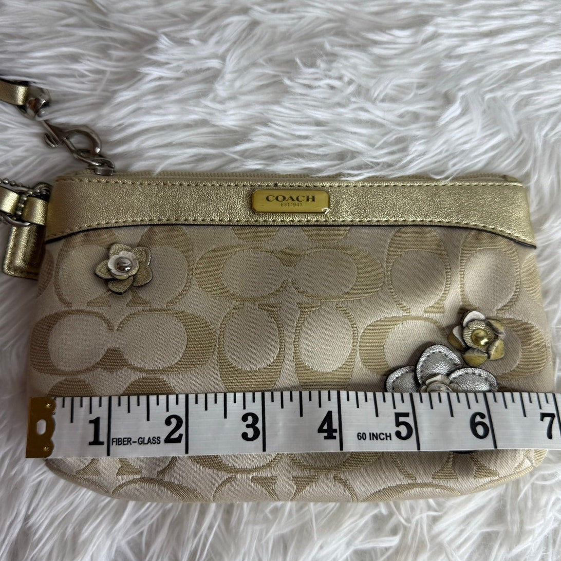 y2k COACH Gold Tan Floral Signature Canvas Wristlet