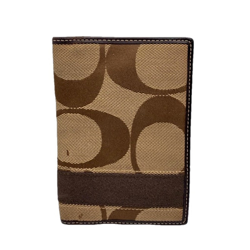 COACH Brown Signature Passport Holder