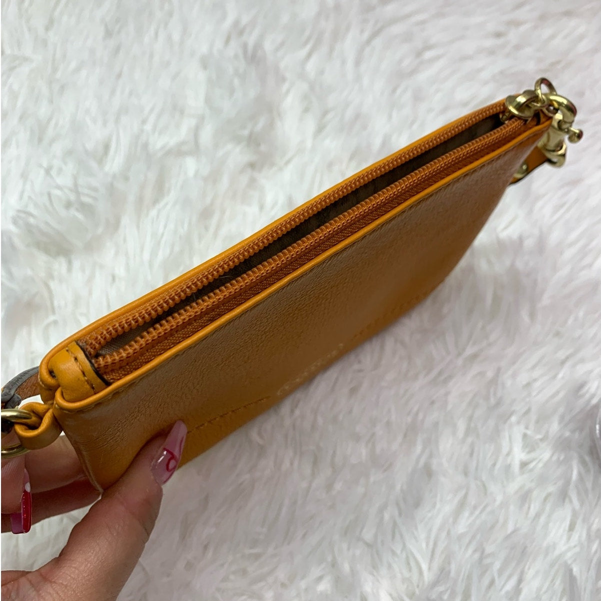 COACH Orange Wristlet