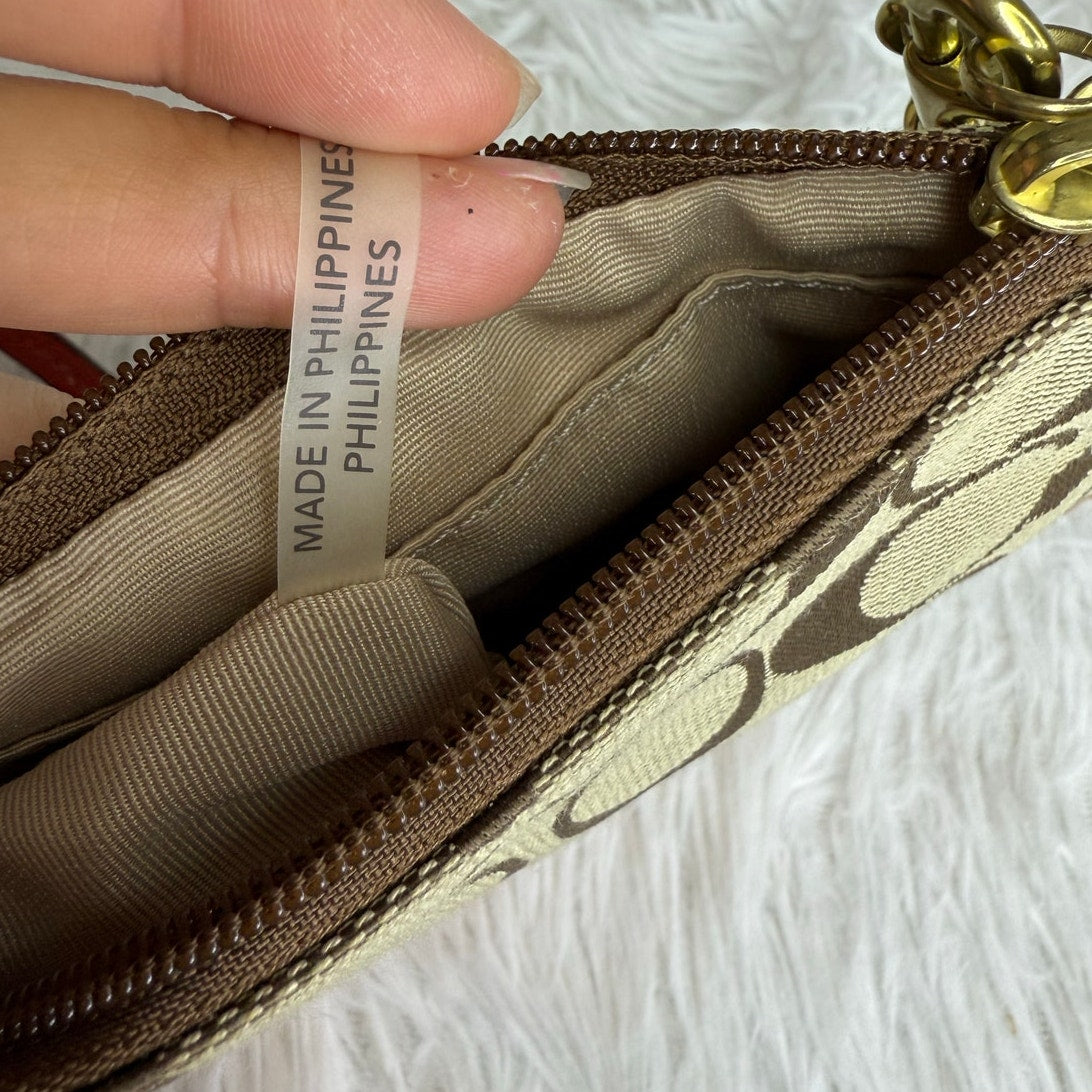 COACH Orange Brown Signature Wristlet