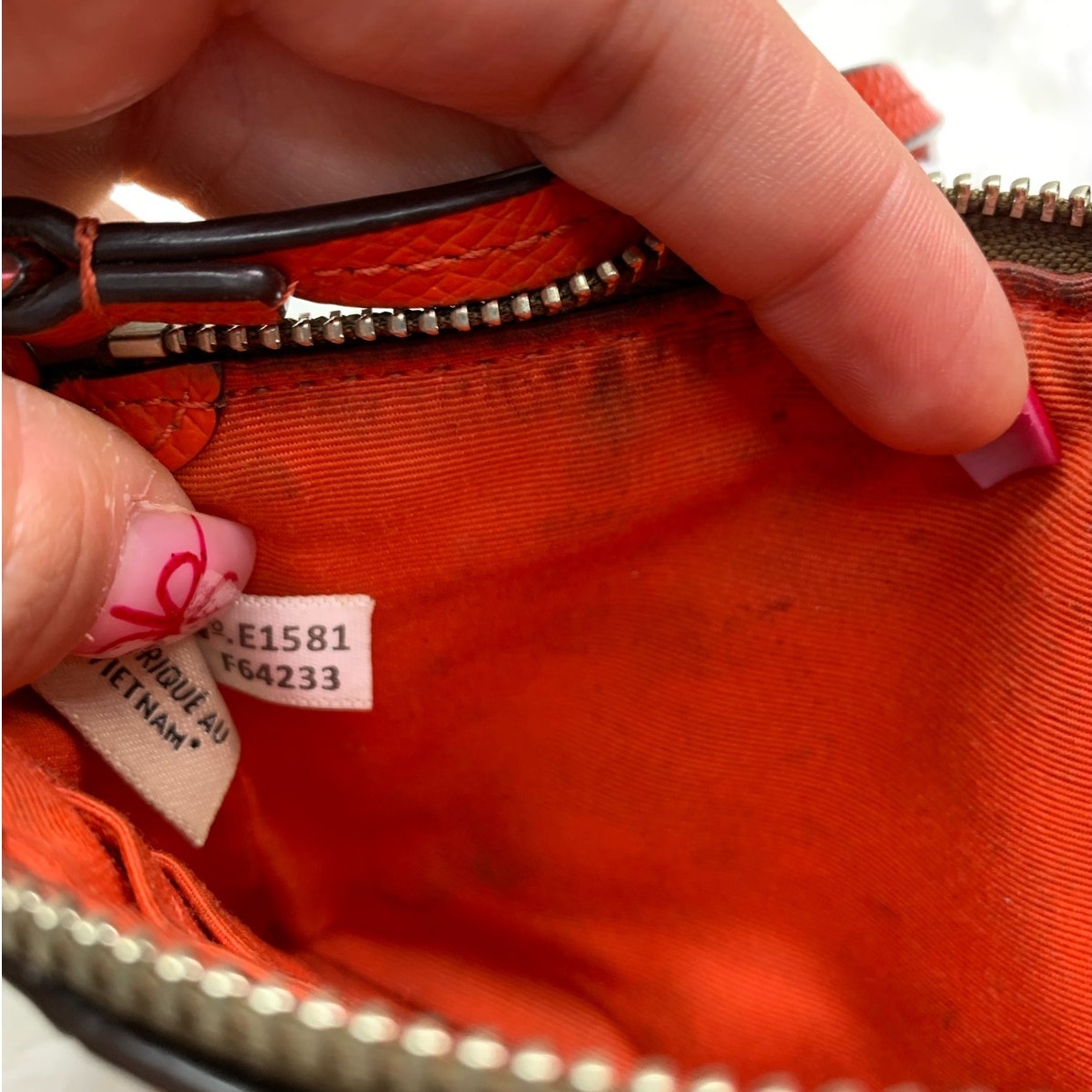 COACH Brown and Orange Coated Canvas Wristlet