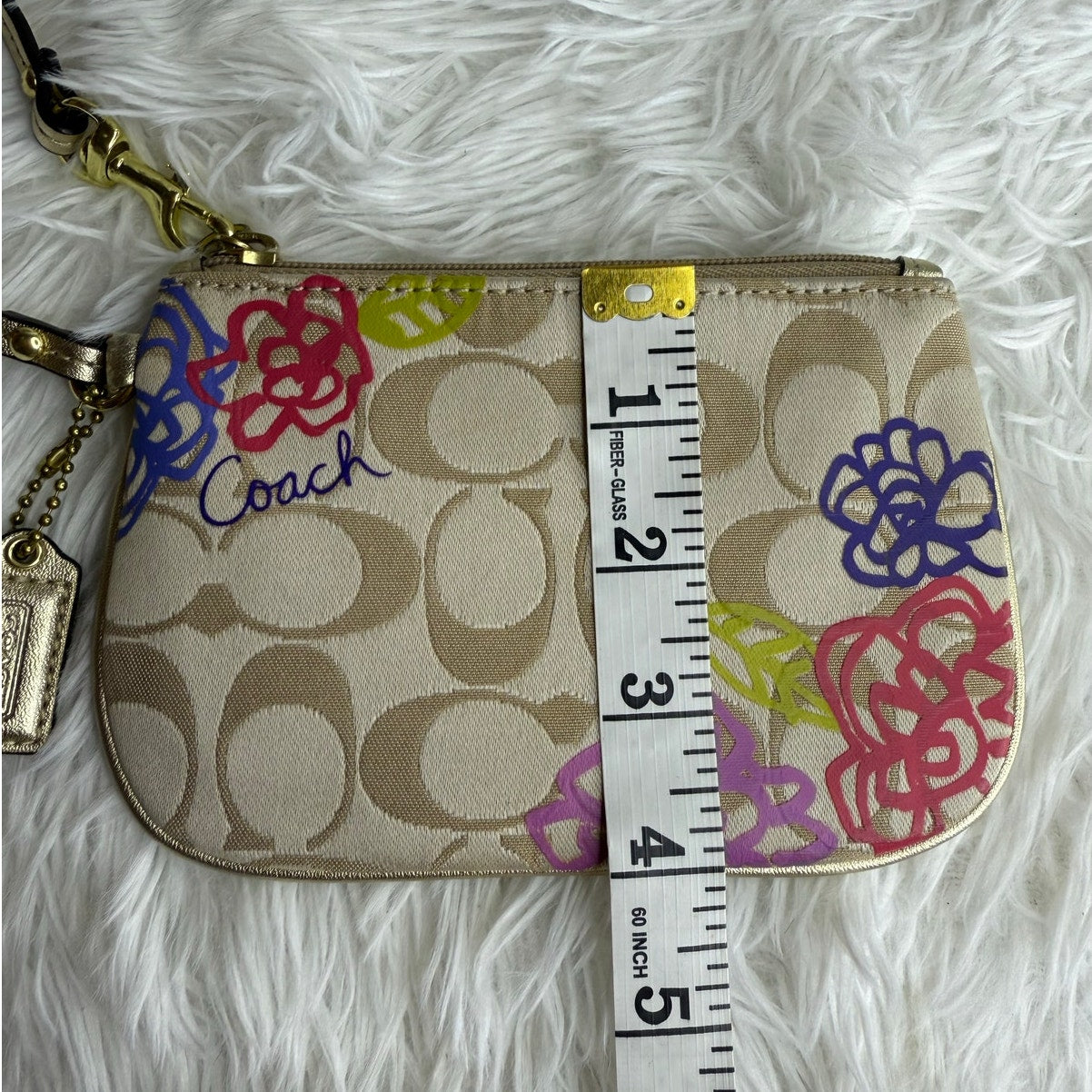 COACH Tan Gold Floral Signature Canvas Wristlet