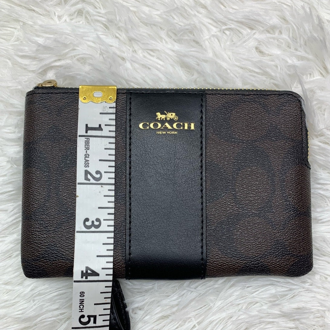 COACH Brown Coated Canvas Signature Wristlet