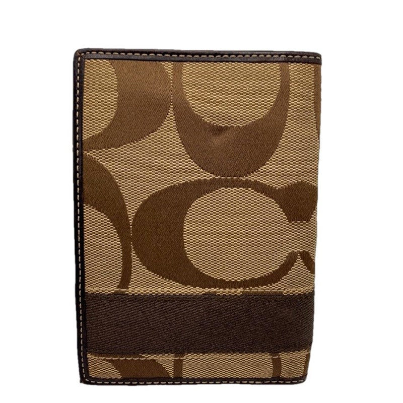 COACH Brown Signature Passport Holder