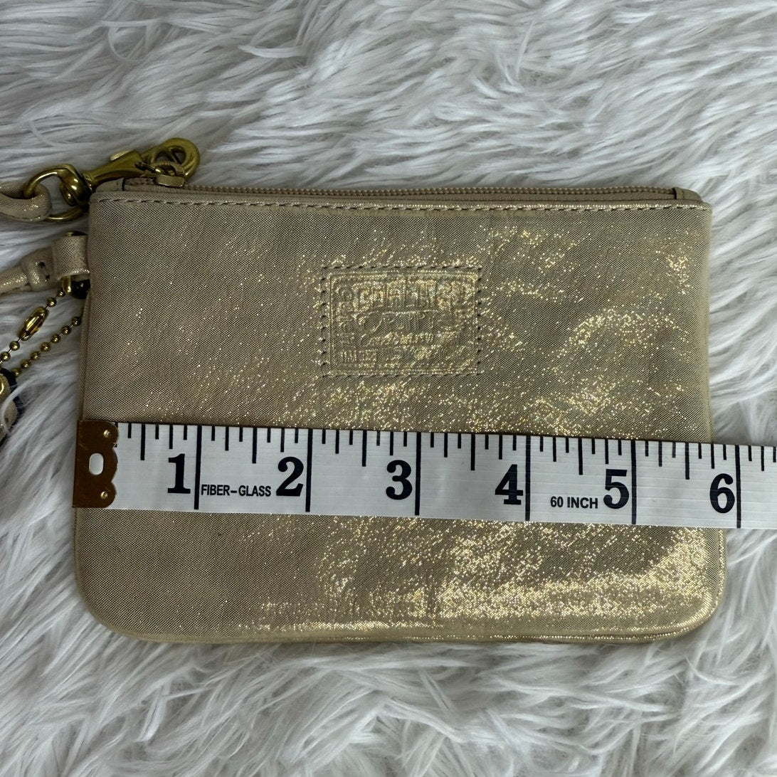 COACH Gold Poppy Wristlet