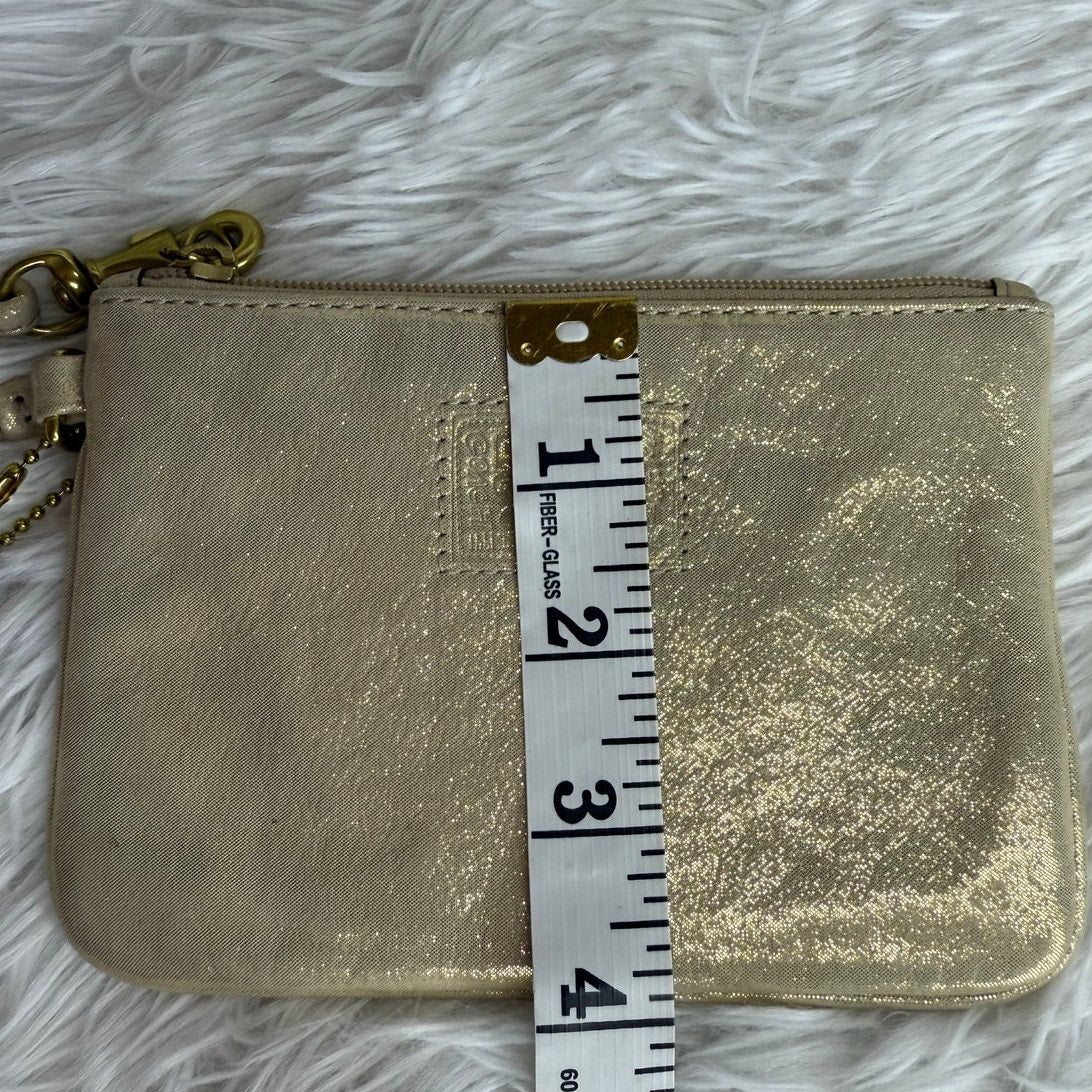 COACH Gold Poppy Wristlet