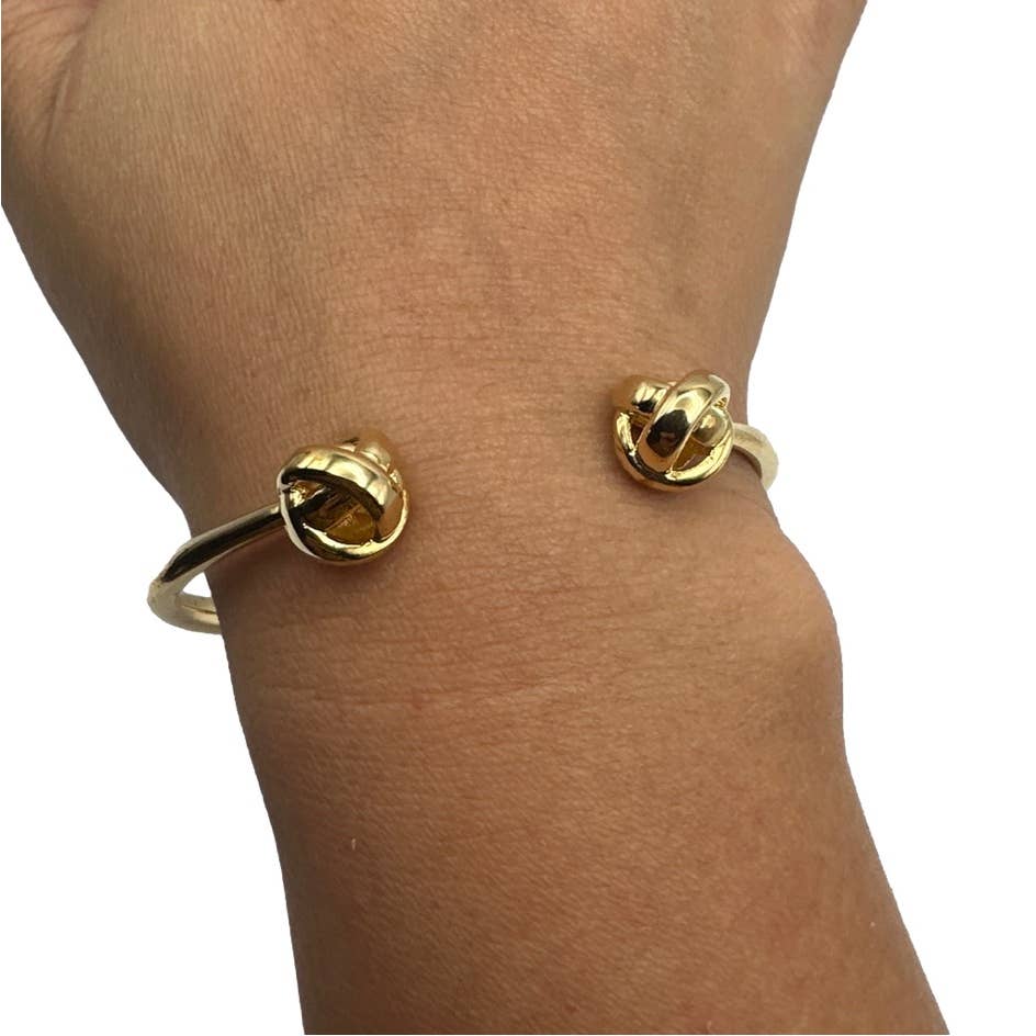 Kate Spade New York 'Dainty Sparklers' knot hinged cuff.