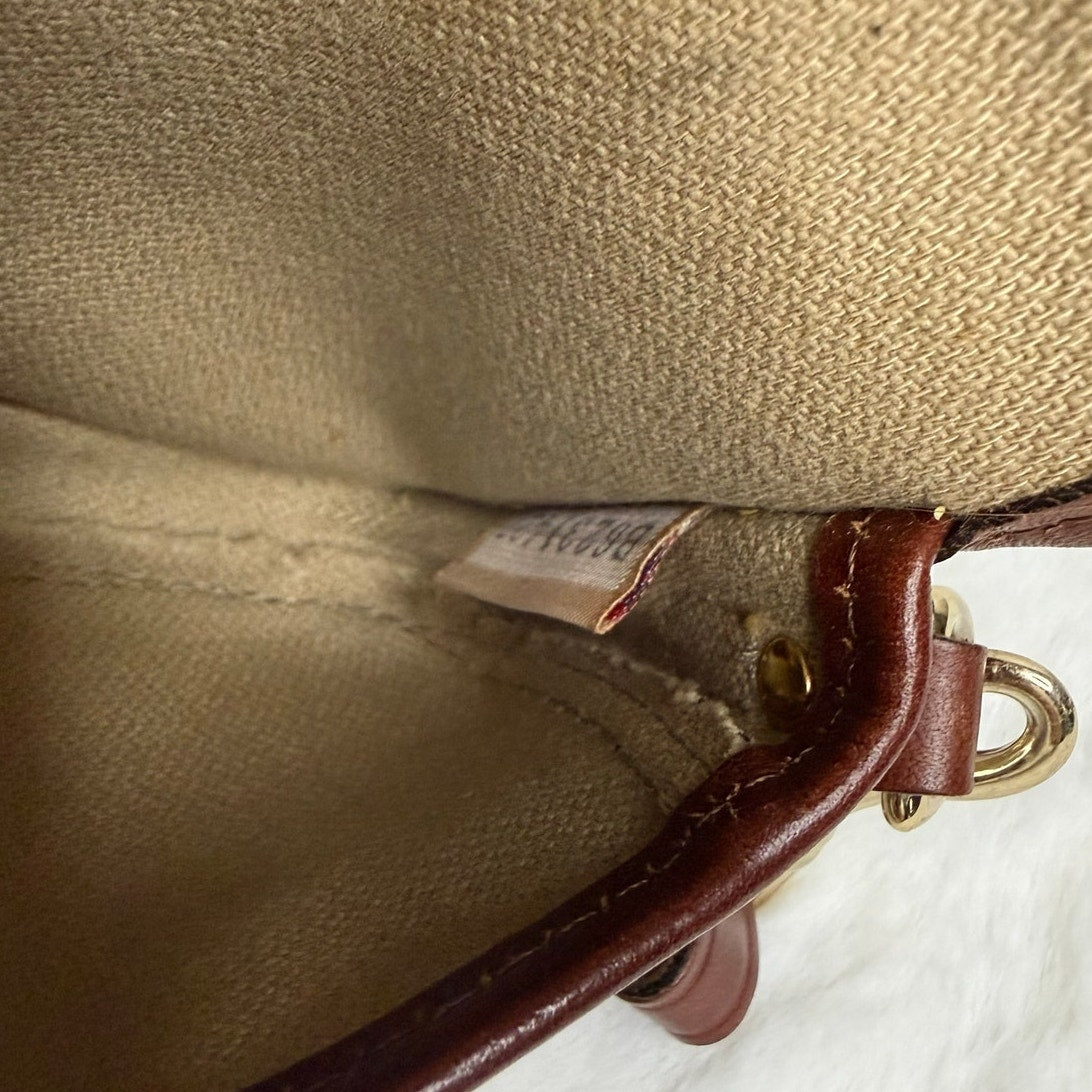 DOONEY & BOURKE Brown Signature Canvas Wristlet