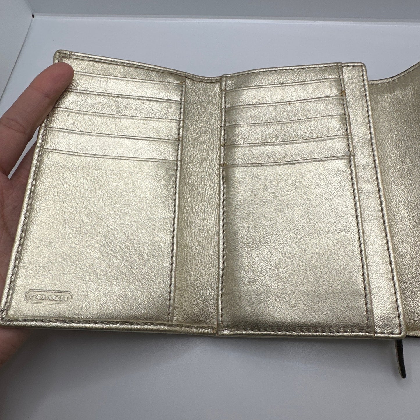 COACH Gold and off white Trifold Wallet