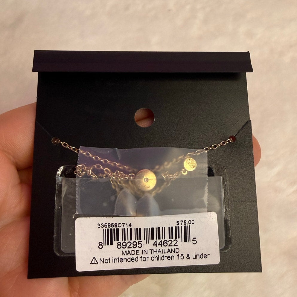 COACH Gold Tone Pave Bow Slider Bracelet