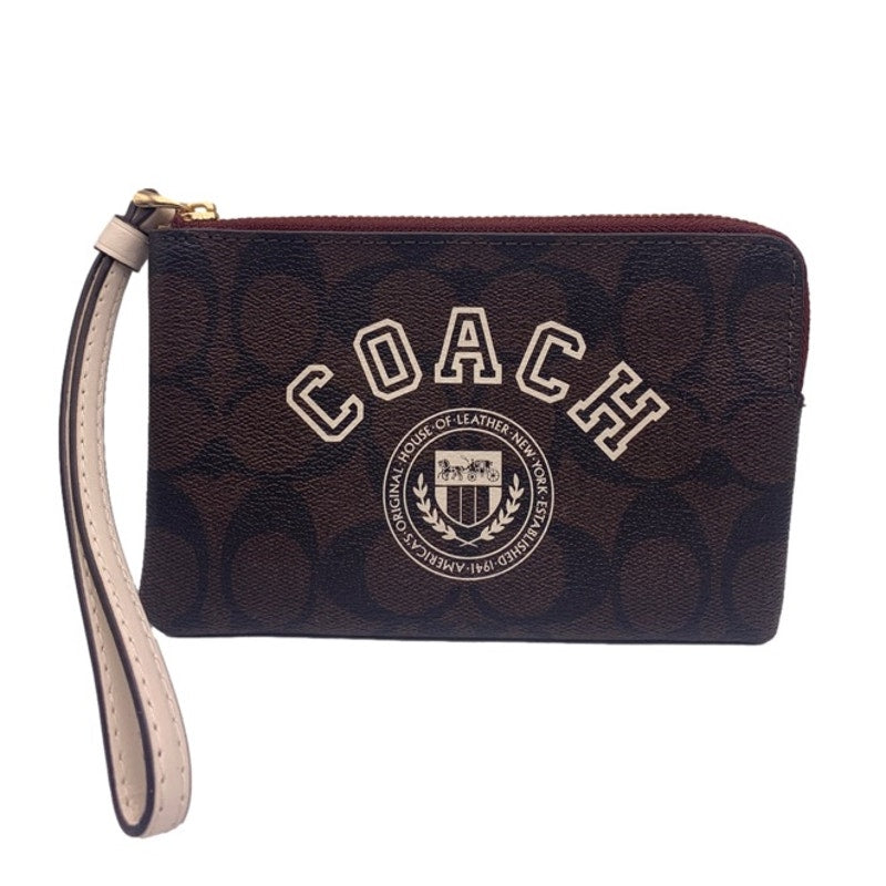 COACH Brown Coated Canvas Wristlet