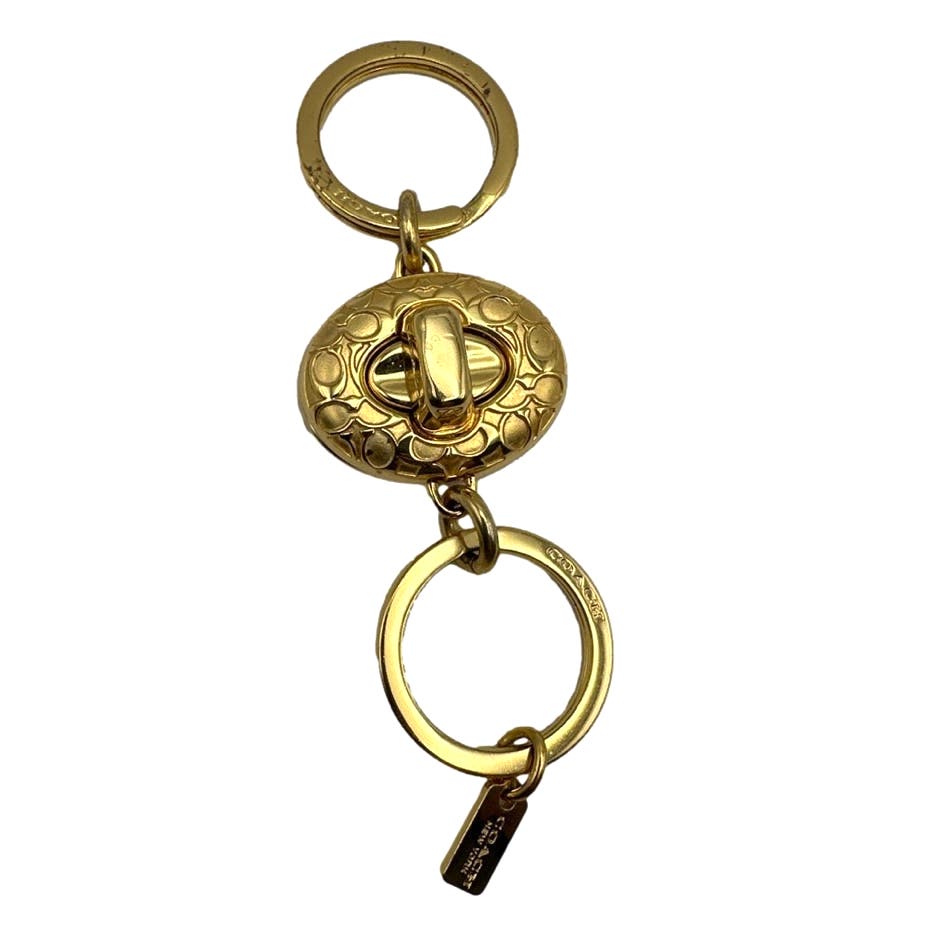 COACH Gold Toned turn-lock crystal key fob / Bag Charm